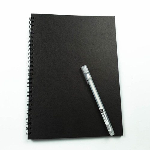 black notebook with white gel pen comicool shop